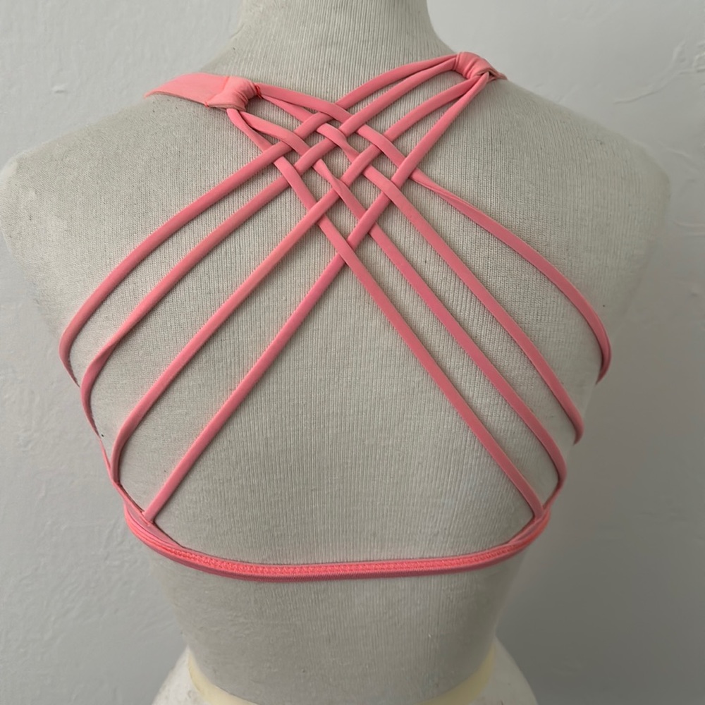 Coral/pink low impact Lululemon sports bra.